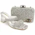 Pochette et Chaussure argent (Location)